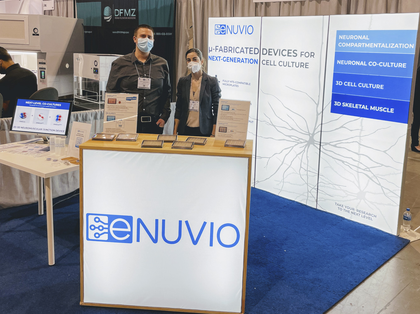 Photo of co-founders Elise Faure and Mark Aurousseau representing eNUVIO at the SLAS2022 conference in Boston